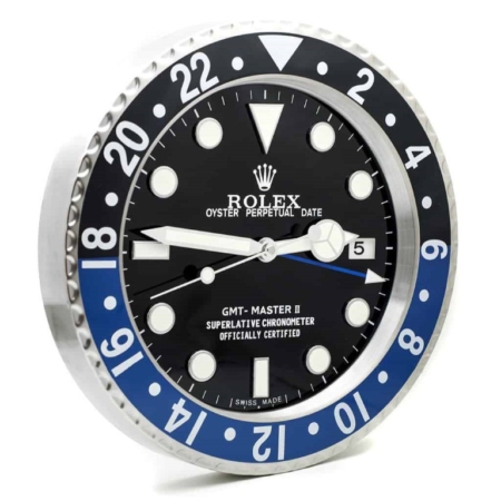 Rolex wall clock. Wall clock in the style of a Rolex GMT-Master II 'Batman' wristwatch. Black dial with a black /blue & stainless steel bezel.
