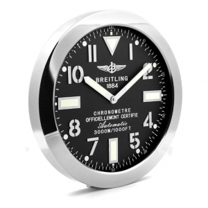 Breitling wall clock. Wall clock in the style of a Breitling Avenger wristwatch. Black dial, silver hands with a mirror polished stainless steel bezel.