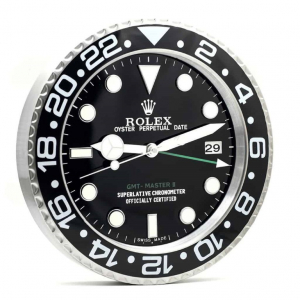 Rolex wall clock. Wall clock in the style of a black dial stainless steel Rolex GMT Master II wristwatch.