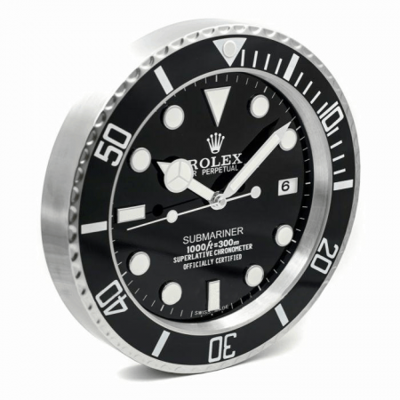 Rolex wall clock. Wall clock in the style of a black dial stainless steel Rolex Submariner wristwatch.