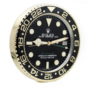 Gold Rolex GMT-MASTER II style wall clock with a black dial and black bezel.